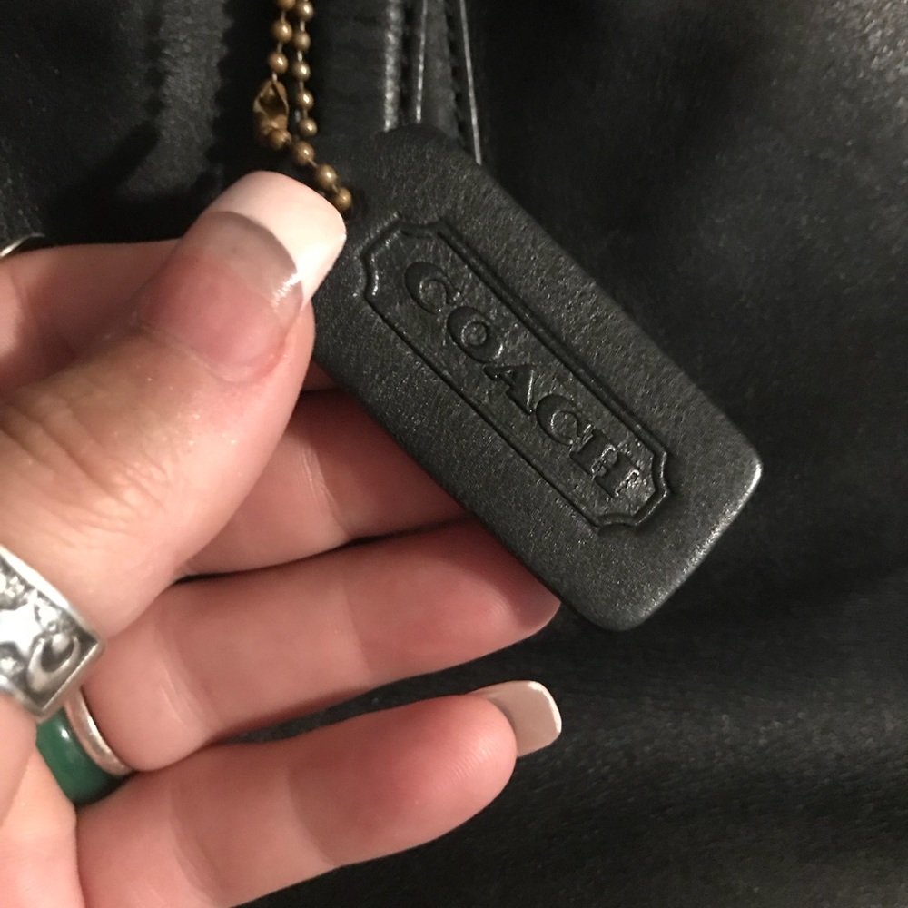 Coach purse in pristine condition black leather